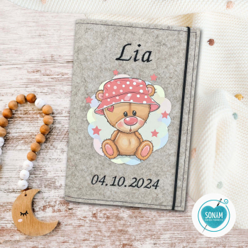 Designbeispiel der U-Heft Hülle in beige meliert Teddy mit Sternen für Mädchen